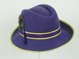 Violet velour trilby trimmed with peacock feathers and lime ribbon
