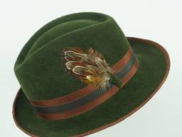 Forest green velour trilby with ribbon and feather trim.